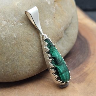 Rare malachite stalactite pendant set in sterling silver fire setting